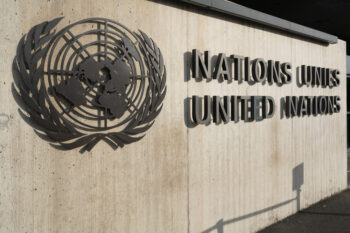 Geneva Switzerland , 3 January 2020 : UN logo with name at the entrance of the United Nations office in Geneva Switzerland