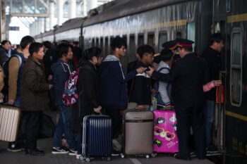 Passengers who head home for the upcoming Chinese Lunar New Year, also known as Spring Festival, wait to check their tickets at the Nanjing Railway Station in Nanjing city, east China's Jiangsu province, 12 January 2017.

About 2.98 billion trips are expected to be made during China's 2017 Spring Festival travel rush between Jan. 13 and Feb. 21, China's top economic planner said Thursday (12 January 2017). The figure represents an increase of 2.2 percent from the same period in 2016, with air travel to see the fastest growth among all transportation modes, Zhao Chenxin, spokesperson for the National Development and Reform Commission, said at a press conference. The number of road trips is projected to reach 2.52 billion, a 1-percent increase from last year, while train trips are likely to top 356 million during the period, up 9.7 percent year on year, Zhao said. More breakdown figures showed that air travel will likely top 58.3 million trips, surging 10 percent from last year, while boat trips are predicted to reach 43.5 million during the period, up 2 percent year on year, said Zhao. Transportation authorities have been prepared for the travel peak, but snow, fog and other abnormal weather conditions in some regions will add pressure to this year's holiday travel rush, Zhao added. The Spring Festival, or Chinese Lunar New Year, falls on Jan. 28 this year. The festival is the most important occasion for family reunions.