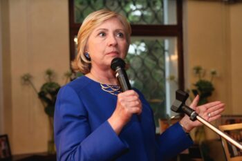 Washington, USA - March 08 2016: Hillary Clinton holding a microphone and giving a speech